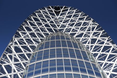 TOKYO, JAPAN - JANUARY 12, 2013: the Cocoon Tower in Shinjuku with a bluye sky in the background, Tokyo, Japanのeditorial素材