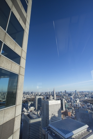 Central Tokyo skyscraper under clear blue skyのeditorial素材