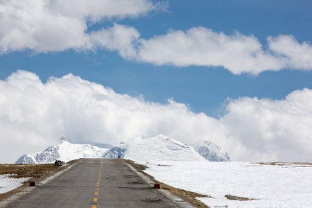 Road of Friendship in Tibet with the view of the mountains and the road, fantastic illusionの写真素材