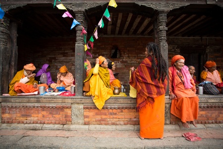 NEPAL, BHAKTAPUR, APRIL 24: Traditional unidentified local women working and drinking Tea in a temple, Kathmandu, 22 April 2013のeditorial素材