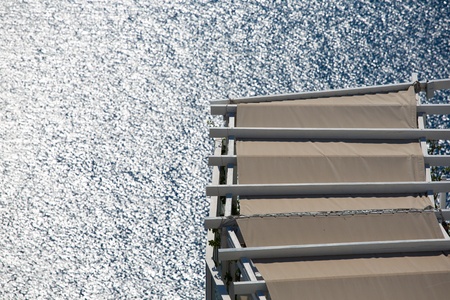Roof of a balcony and the Mediterranean sea,  Santorini in Greece