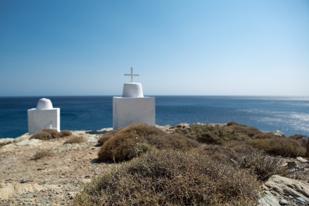 Religious domes and orthodox crosses, with the aegan sea in the background, Folegandros, Cyclades Islands. These Religious domes and churches are scattered across the tiny island, often in incredibly remote and uninhabited areas of the island. Greece, 201の写真素材