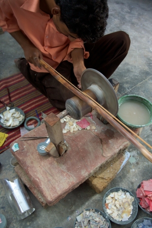 AGRA, INDIA, JULI 19: Unidentified Craftsman working for Tara, a Fair Trade Organization based in Agra, India and specialized in soap stone products, more or less 1000 Artisans work for Tara within ethical rules. India 2013.のeditorial素材