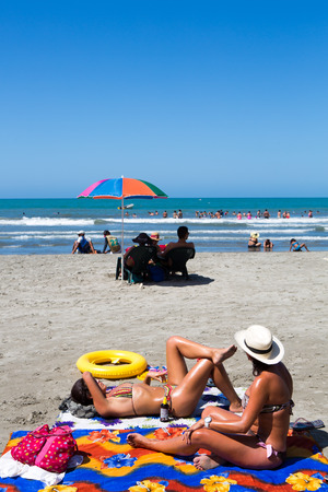 CARTAGENA, COLOMBIA, JANUARY 10: Unidentified girls sun bathing on the Bocagrande beach in Cartagena, Colombia, 2014.のeditorial素材