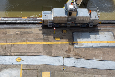 MIRAFLORES LOCKS, PANAMA, JANUARY 03: Trains (mules) side Panama Canal. These mules are used for side-to-side and braking control in the rather narrow locks on January 03 2014 in Panama City.のeditorial素材