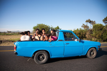 CAPE TOWN, SOUTH AFRICA, DECEMBER 14: unidentified group of South African people travelling in the...