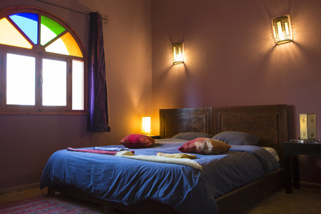 Beautiful authentic arabic bedroom in a traditional Moroccan riad (guesthouse). Essaouira, Moroccoのeditorial素材