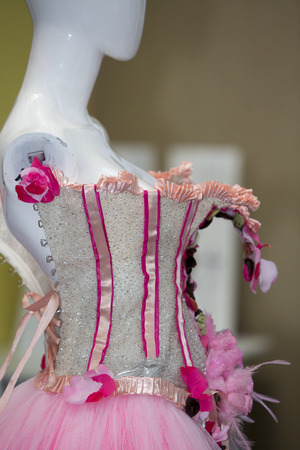 BRUSSELS, BELGIUM, FEBRUARY 7: Fake Model with with pink designer dress during fashion show at the Salon du Chocolat on February 7, 2014 in Brussels, Belgiumのeditorial素材