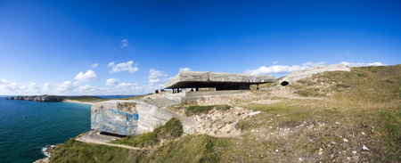 Panorama of a German bunker from the Second World War and the Atlantic Ocean. At the the Pointe de...