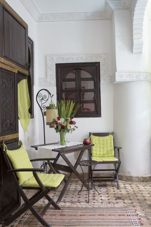 Interior view of an Arabian Riad interior with traditional furnitures, carpets, Marrakech, Morocco, North Africa.のeditorial素材