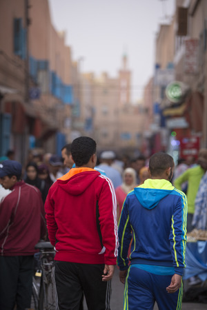 Tiznit, Morocco - August 26, 2014: Unidentified people walking and shopping in the old street of Tiznit in Morocco. 2014. Tiznit is a town in the southern Moroccan, founded in 1881. Tiznit is well known for its silver jewellery, daggers and sabres.のeditorial素材