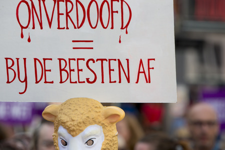 BRUSSELS, BELGIUM, SEPTEMBER 28: Belgian Gaia activists protest on the streets of Brussels on September 28, 2014 against slaughter without stunning. Support of people to petition for stunning animals before slaughter so they are unconscious before being kのeditorial素材