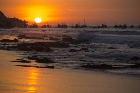 Panorama of the harbor of Manora during a wonderful orange sunset. Peru 2015の写真素材