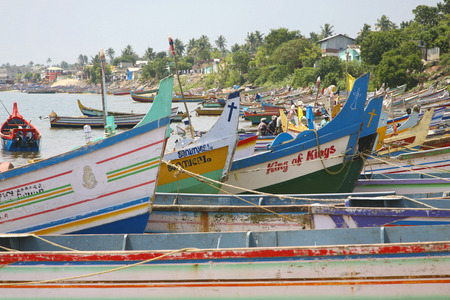 KOCHI, INDIA, JANUARY 14: Group of colored wooden fisher ships standing on the beach of Kochi. Kerala State, India 2009のeditorial素材