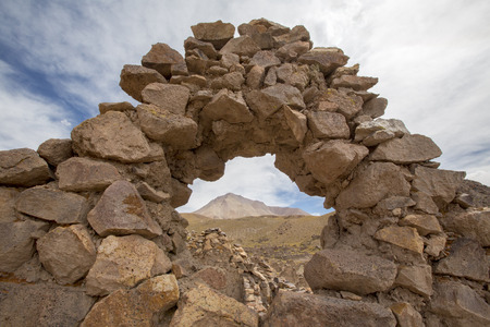 Abandoned and decaying church in San Antonio ghost village at the footstep of San Antonio volcano in the Bolivian altiplano.の写真素材