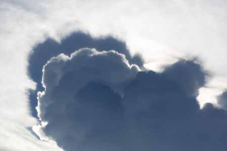 Strange terrific shape of clouds in the blue sky of Rurrenabaque in Bolivia. Rain storm weather to...