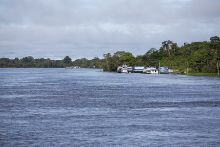 SANTO ANTONIO DO ICA, BRAZIL, MARCH 18: Harbor of Santo Antonio Do Ica with blue sky, on the Amazon River. Brazil 2015のeditorial素材
