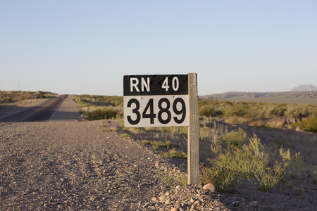 Distance Sign road on paved road on the famous Ruta 40 (Route 40) near the town of San Juan. Argentinaの写真素材