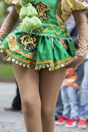 SALTA, ARGENTINA, DEC 18: Young women performers dancing and celebrating the opening of the carnival of Salta in the street with colorful costumes. North of Argentina 2014のeditorial素材