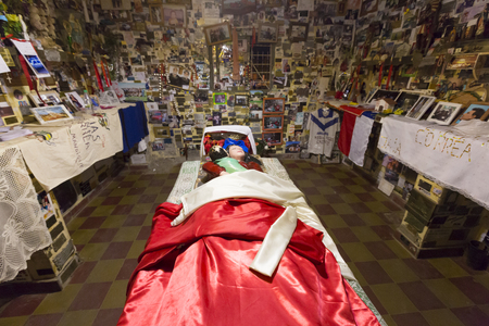 VALECITO, ARGENTINA, DEC 15: Interior of the Deceased Correa in Spanish Difunta Correa pilgrimage landmark in San Juan Province, with many offerings Argentina 2014のeditorial素材