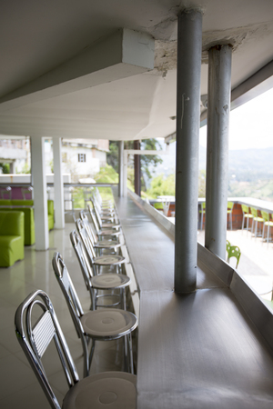 Open colored modern bar and restaurant with view on the lakes and islands in Guatape with the Piedra el Penol. Colombia 2015の写真素材