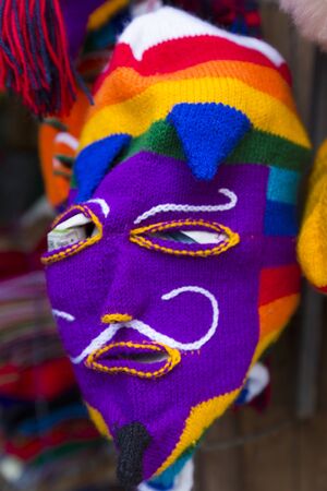 Peruvian colored woolen mask for sale at the tourist craft market in Cusco. Peruの写真素材