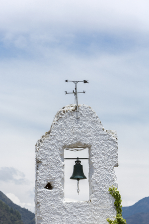 Closeup of architectural detail part of the Basilica of the Senor de Monserrate with blue sky, designed by architect Arturo Jaramillo Concha in 1925. Located on the Cerro de Monserrate in Bogota Colombia.の写真素材