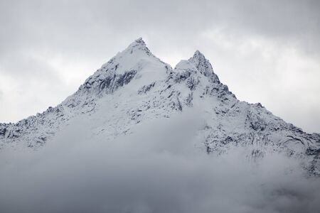 Beautiful snow covered mountain peak in the Cordillera Blanca range of Huascaran National Park, Peru