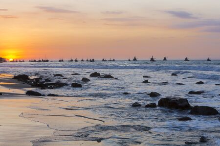 Panorama of the harbor of Manora during a wonderful orange sunset. Peru 2015の写真素材