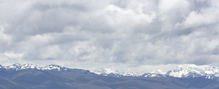Beautiful snow covered mountain peak in the Cordillera Blanca range of Huascaran National Park, Peruの写真素材