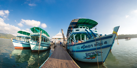Panoramic view of tourist ships anchored at the pier of Bang Bao village. Koh Chang island. Trat Province. Thailand, 2016.のeditorial素材