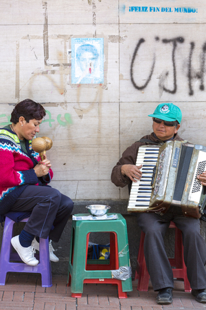 Two blind musicians playing music in the old area of ??Quito. Ecuador 2015のeditorial素材
