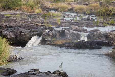 Epupa falls on the border of Namibia and Angola. The falls are created by the Kunene River in the Kaokoland area.の写真素材