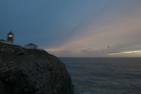 Lighthouse of Cabo Sao Vicente, Sagres, Portugal at Sunset - Farol do Cabo Sao Vicente. Portugalのeditorial素材