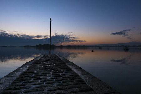Colored sunset taken from the Island of Arz in Brittany (Morbihan), France.の写真素材