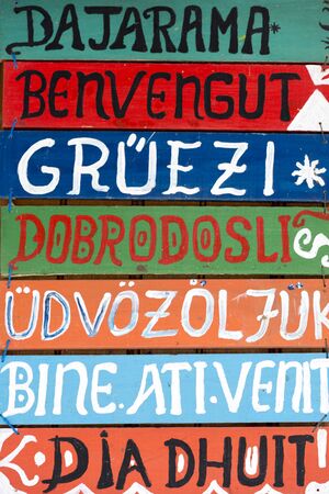 Greeting / Hello wooden signs written in different languagesの写真素材
