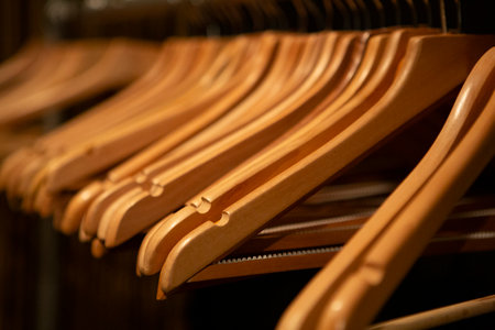 A row of hangers without clothes in a concert hallの写真素材