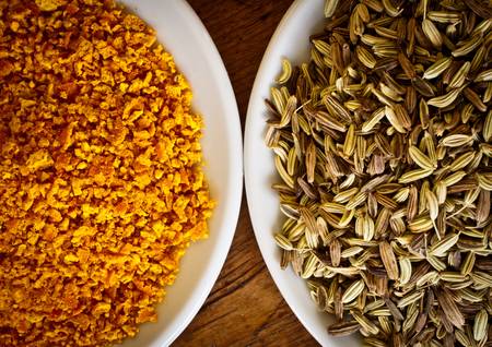 High contrast cuisine   fennel seeds and dry orange rind 