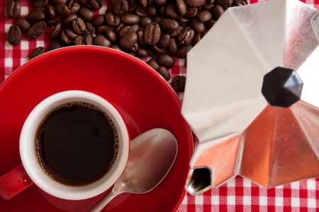 Morning fragrance  a cup fresh coffee with coffee beans and coffee machine, detailの写真素材