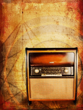 Old vintage radio, an original from the 1950s, against distressed abstract background  の写真素材