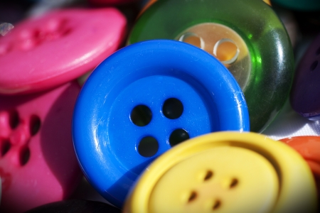 Closeup on group of vintage buttons  Focus on the blue one in the middle の写真素材