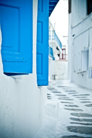 Blue shutters close-up on a quiet back street in Mykonos, Greece.
の写真素材
