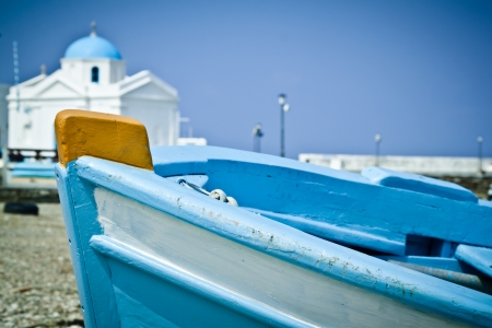 A blue boat on the beach in the old harbour, Mykonos, Greece の写真素材