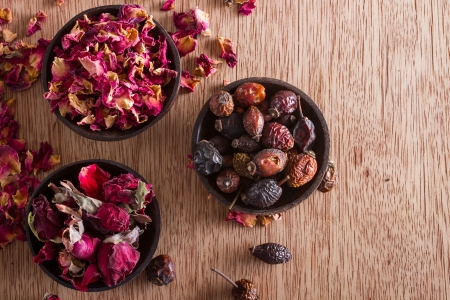 Dried rose hips, buds and petals: for tea, alternative medicine, pot-pourri. Copy space.の写真素材