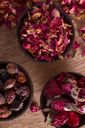 Dried rose hips, buds and petals: for tea, alternative medicine, pot-pourri. Copy space.の写真素材