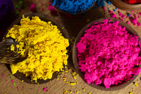 Colorful, finely powdered Indian pigments. Closeup on yellow nad magenta.の写真素材
