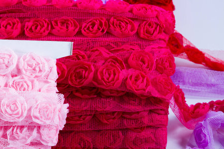 Pretty ribbons with rose patterns in a light mesh material.の写真素材