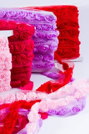Pretty ribbons with rose patterns in a light mesh material.の写真素材
