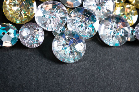 Buttons shaped like fake diamonds, for affordable glamour.の写真素材