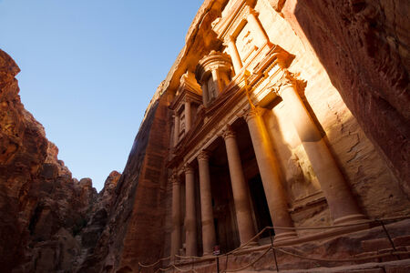 Facade of the Treasury, one of the main monuments in Petra, Jordan, reached after a long walk through a canyon (called siq).の写真素材